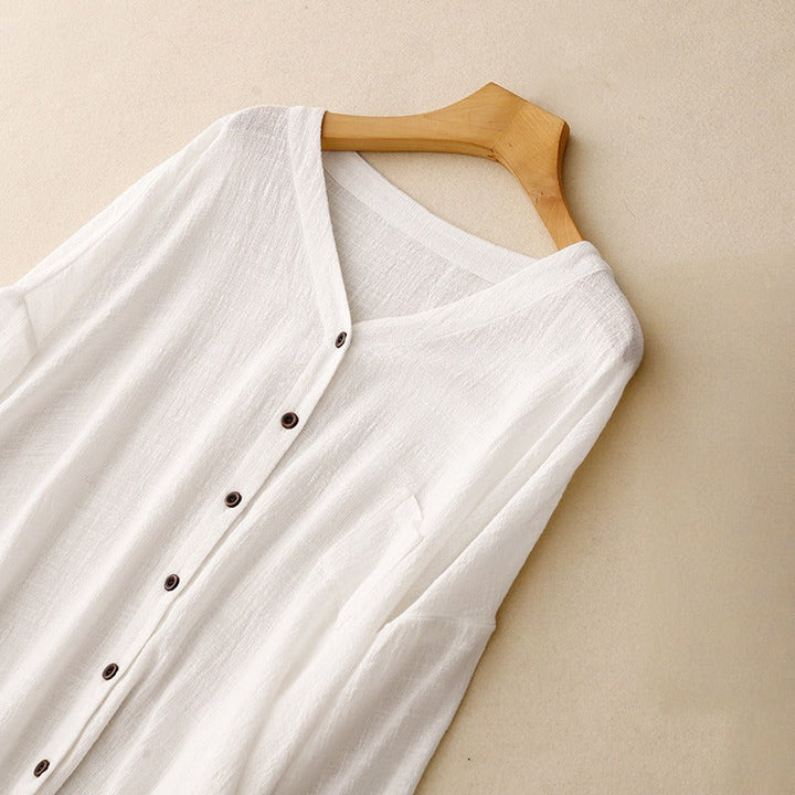 Comfortable women's long sleeve button-up shirt in a relaxed, flowing drape, ideal for versatile everyday spring fashion.