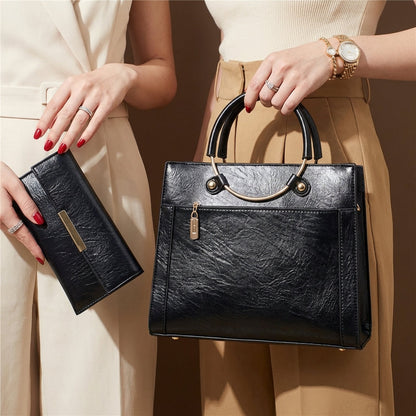 Elegant women's shoulder bag and matching crossbody purse, a stylish multi-piece accessory.