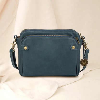 Everyday women's genuine leather crossbody bag, compact, durable, and stylish for modern life.