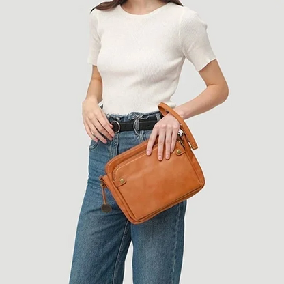 Elegant genuine leather 3-layer women's crossbody bag, durable & stylish for any occasion.