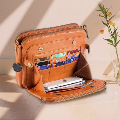 Three-layer design women's leather crossbody bag, providing excellent organization & modern style.