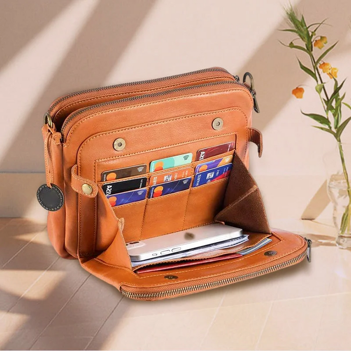 Three-layer design women's leather crossbody bag, providing excellent organization & modern style.