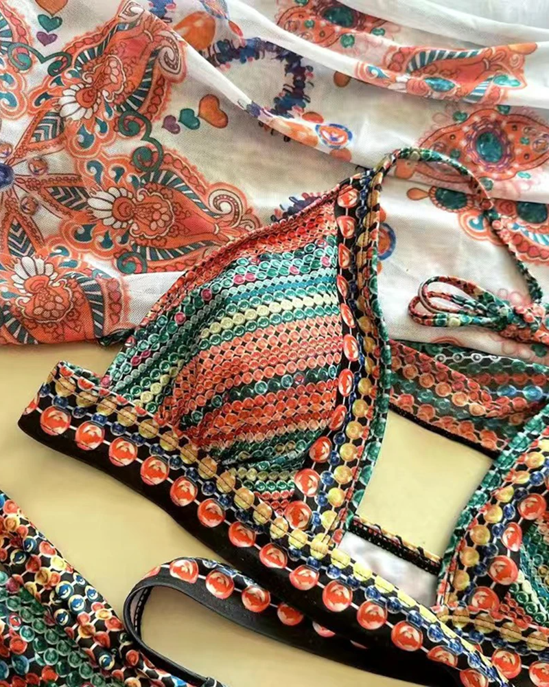 Detailed shot of the artisan style vibrant print on the women's boho 3-piece swim set fabric.