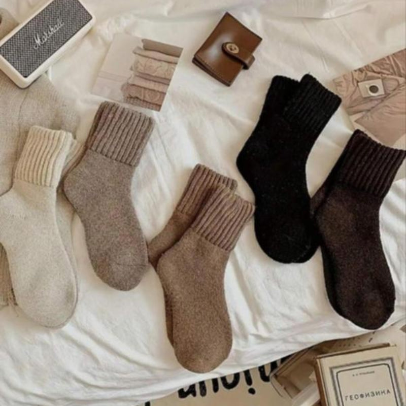 Five pairs of women's warm & cozy winter socks. Essential 5 pack footwear for comfort, daily wear & cold weather.