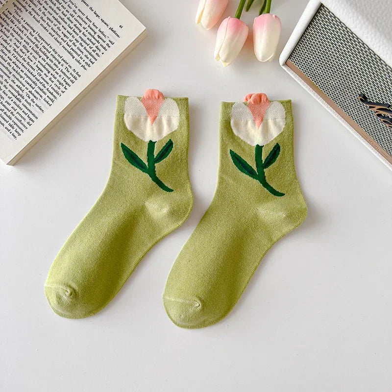 Variety of women's floral print socks from the 5-pack. Comfortable cotton blend mid-calf socks for daily casual use.