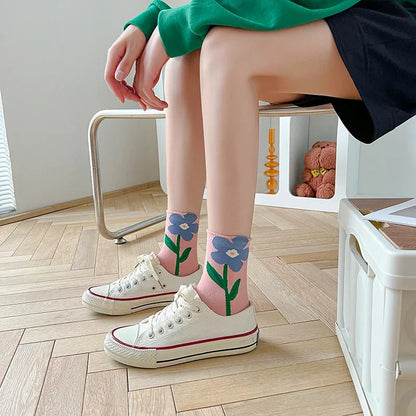 Detailed view of the soft cotton blend fabric on women's floral print everyday socks, cozy for all-day wear.