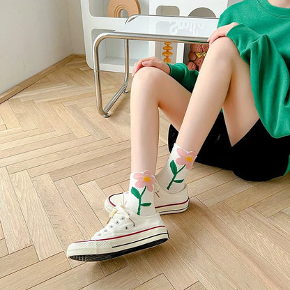 Stylish women's mid-calf socks with delicate floral prints. Perfect cotton blend casual socks for everyday wear.