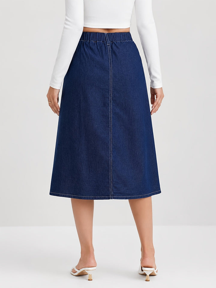Pleated A-line women's denim midi skirt with stylish button front, offering a chic, casual look.