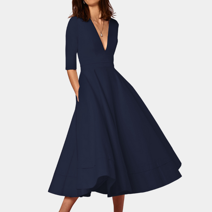 Comfortable women's sleeveless A-line midi dress. Flattering silhouette & stylish side slit for chic outfits.
