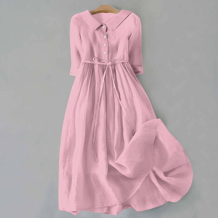 Women's casual A-line midi dress with short sleeves, great for spring outings & summer style.