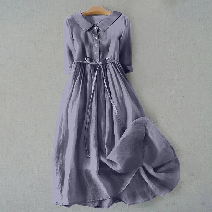 Women's solid A-line short sleeve midi dress, a comfortable and stylish casual everyday outfit.