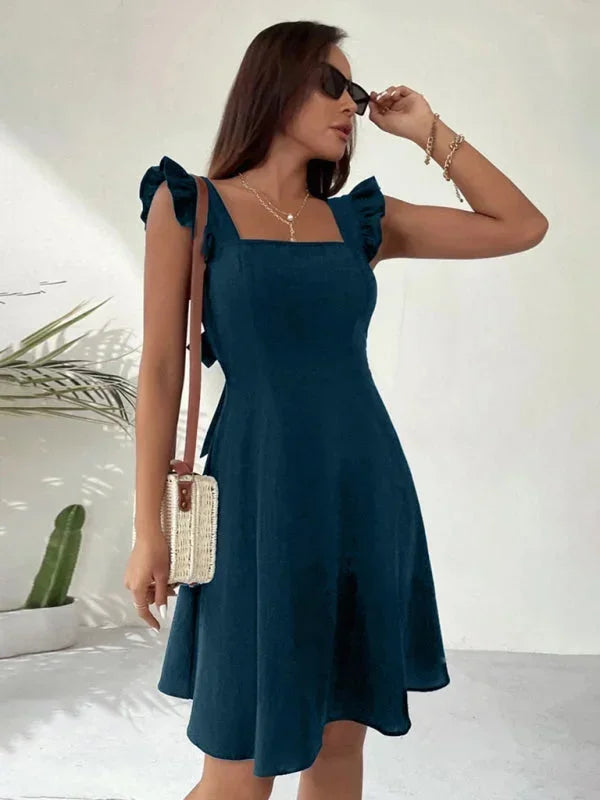 Perfect for summer: Women's A-line mini dress with ruffle straps, square neck, and a bow back.