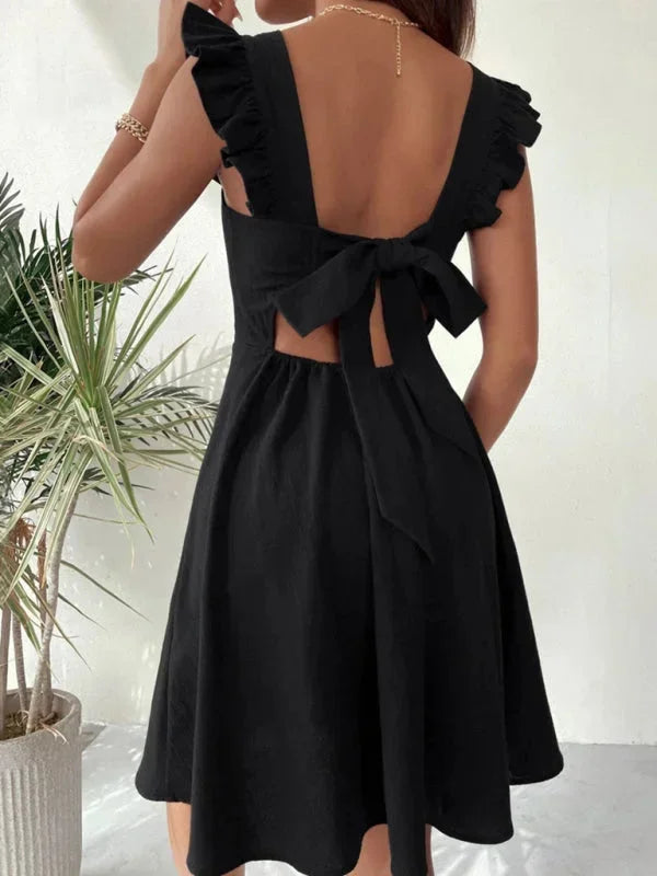 Charming women's casual A-line mini dress featuring ruffle straps, a square neck, and a back bow.