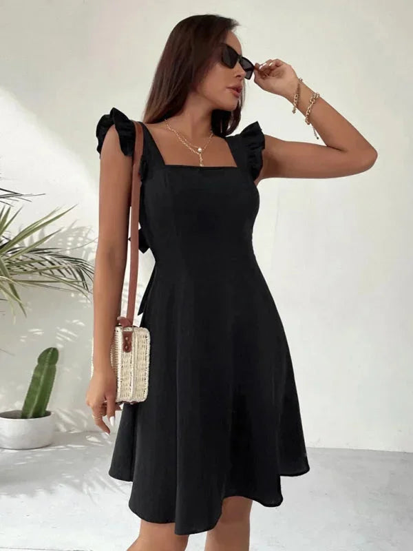 Versatile women's ruffle strap mini dress, A-line cut, with a square neck and a chic bow back.