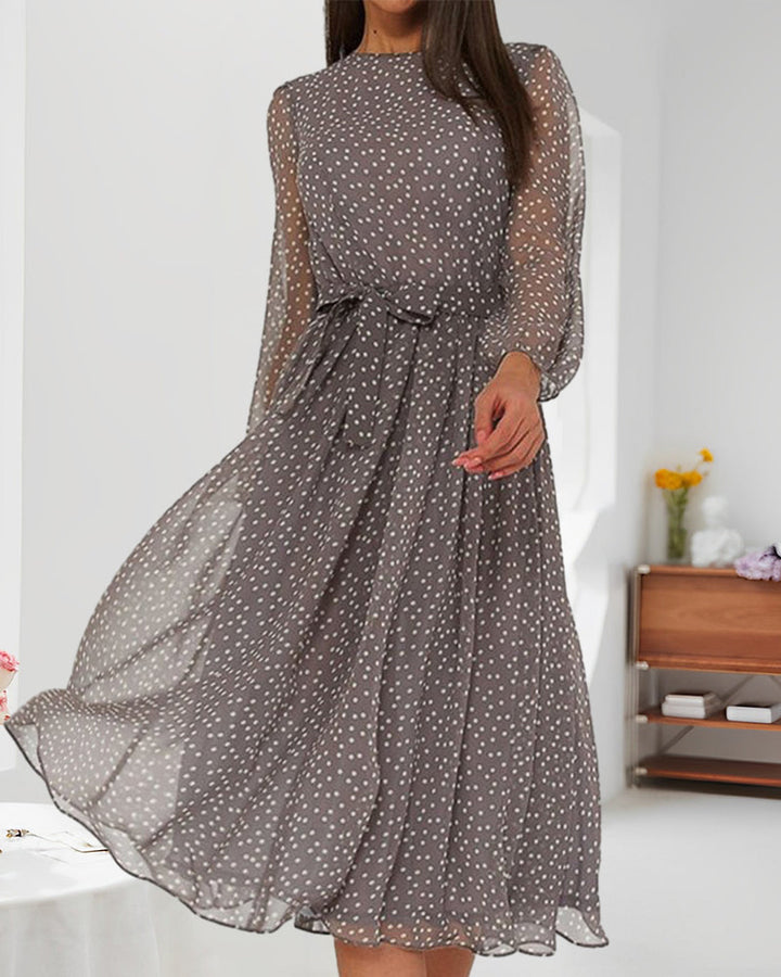 Stylish women's A-line polka dot dress featuring lantern sleeves, knee-length cut, ideal for elegant spring & autumn fashion.