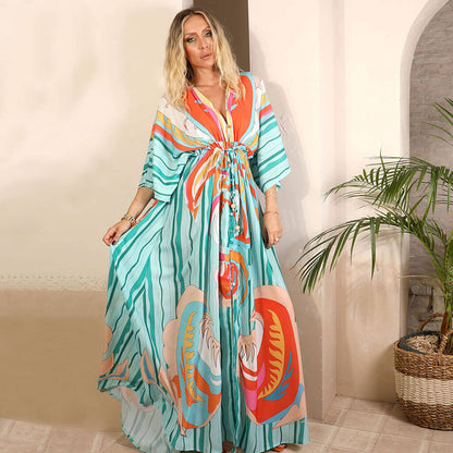 Comfortable, flowy women's summer maxi dress with abstract print, ideal for vacation & resort wear.
