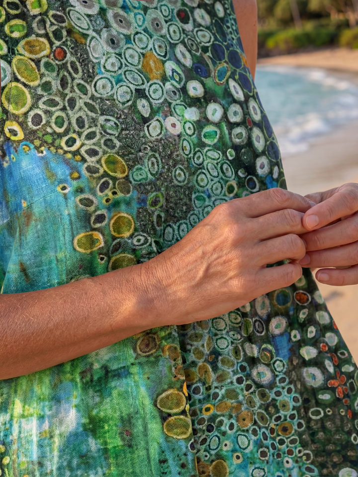 Women's vibrant abstract print sleeveless midi dress, a stylish round neck summer beach dress with pockets.