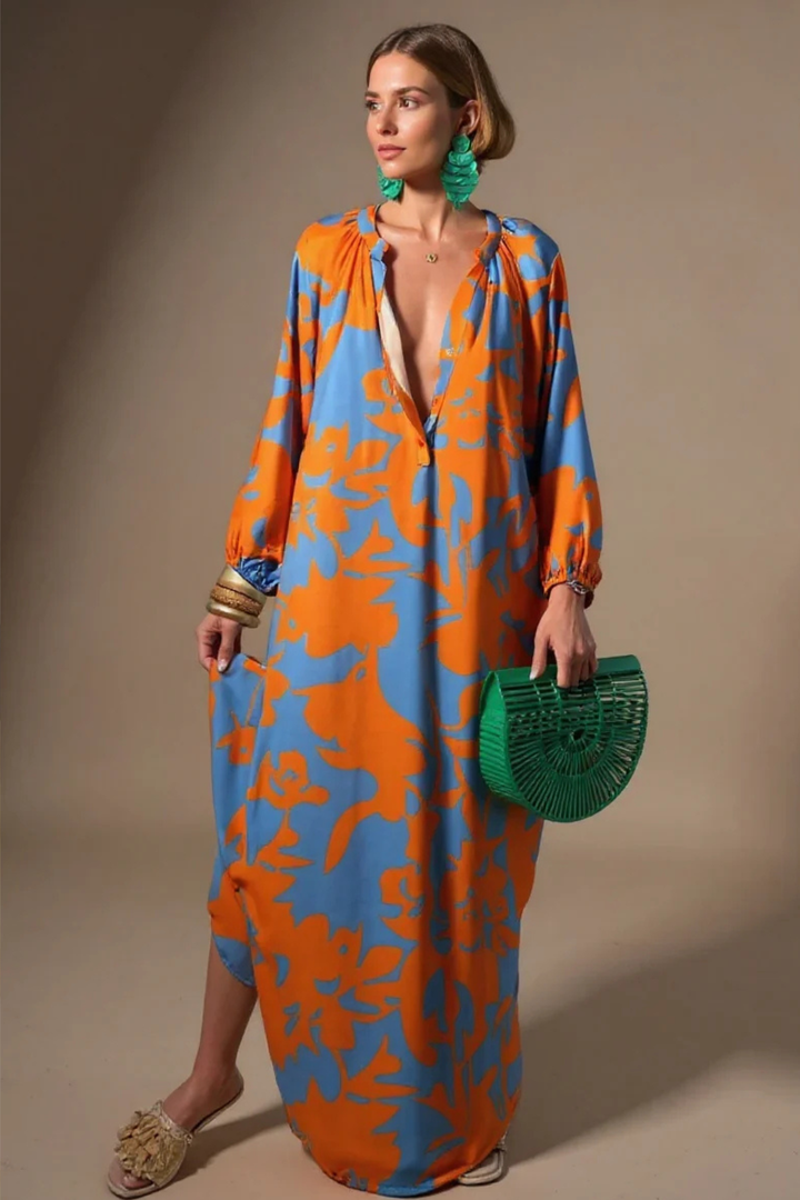 Elegant women's V-neck kaftan maxi dress with unique abstract print. Perfect casual summer or beach resort wear.