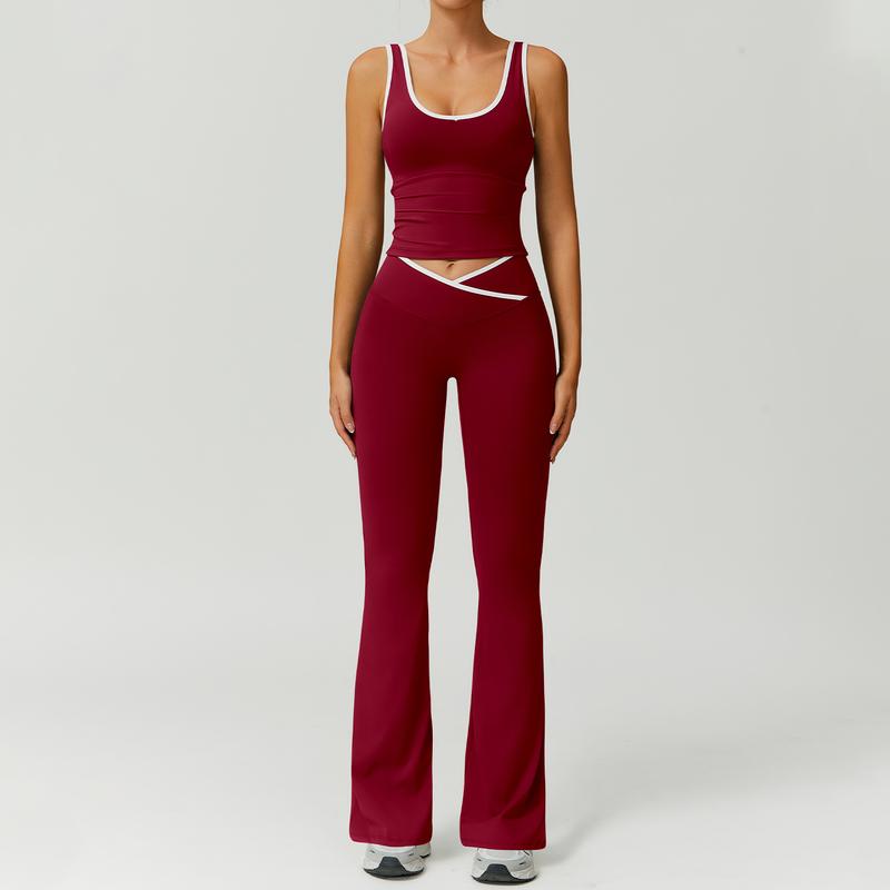 Woman performing yoga in a comfortable capri legging & sports bra workout set for fitness.