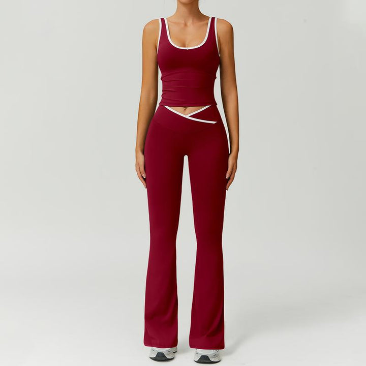 Woman performing yoga in a comfortable capri legging & sports bra workout set for fitness.