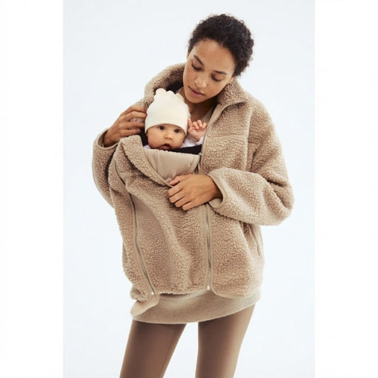 Women's adaptive maternity & baby carrier jacket, versatile for pregnancy, babywearing, & everyday style.