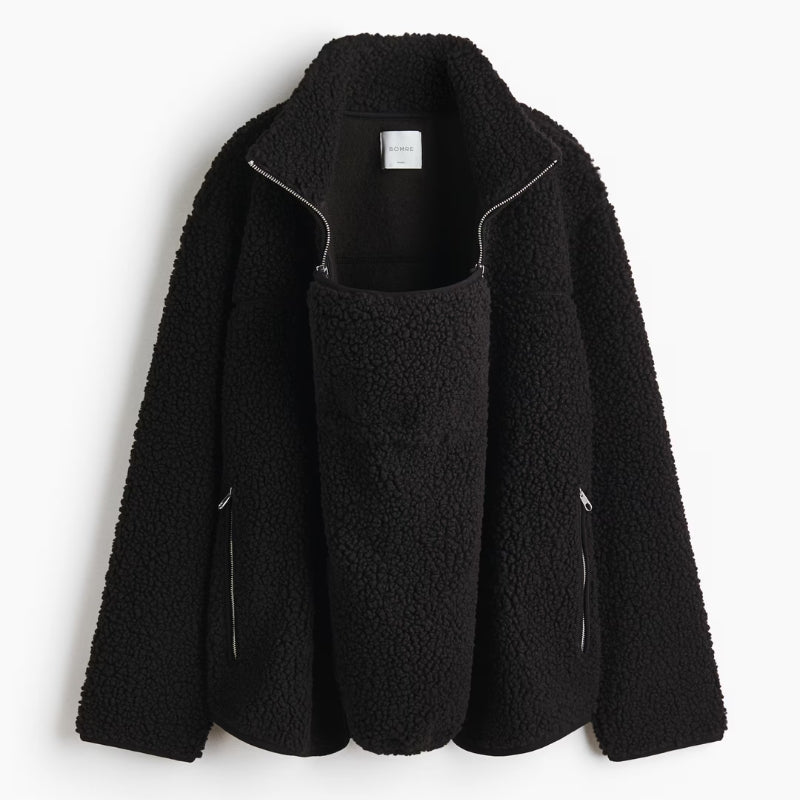 Stylish adaptive jacket for women, ideal for pregnancy, babywearing, & versatile multi-functional motherhood style.