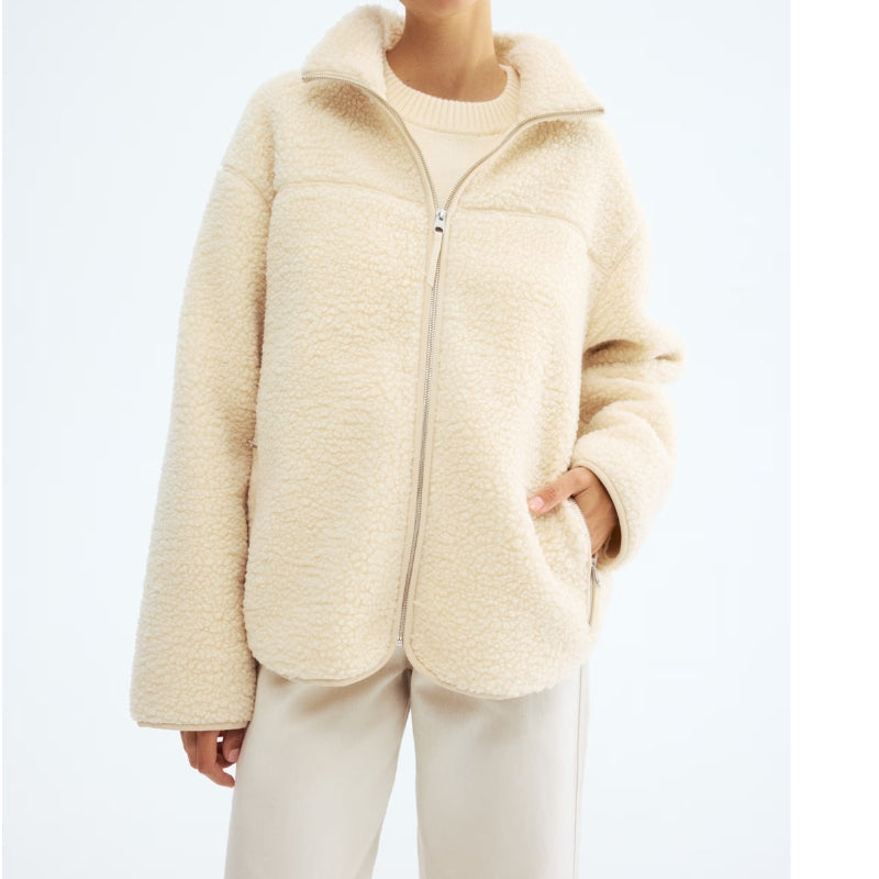 Women's multi-functional adaptive jacket: maternity, baby carrier, & stylish outerwear for fall/winter.
