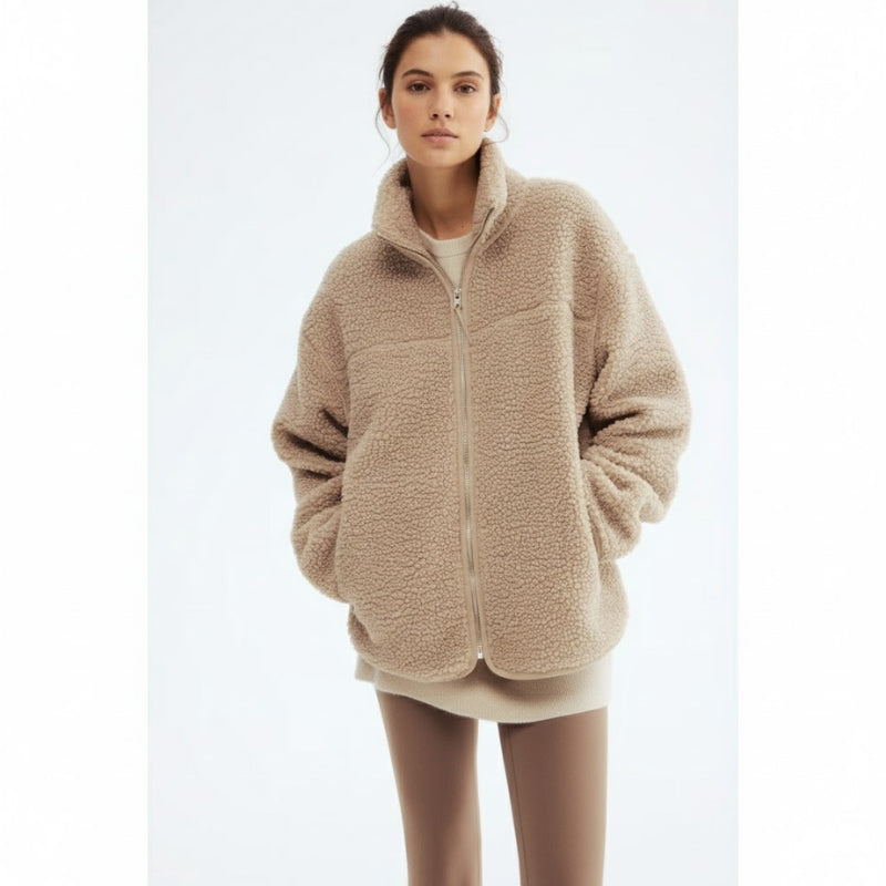 Cozy multi-functional adaptive jacket for women, ideal for maternity wear, baby carrier use, & postpartum comfort.