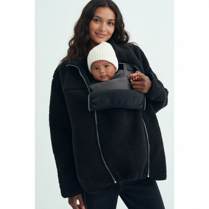 Women's adaptive jacket, perfect for pregnant moms & babywearing, offering warmth and flexible style.