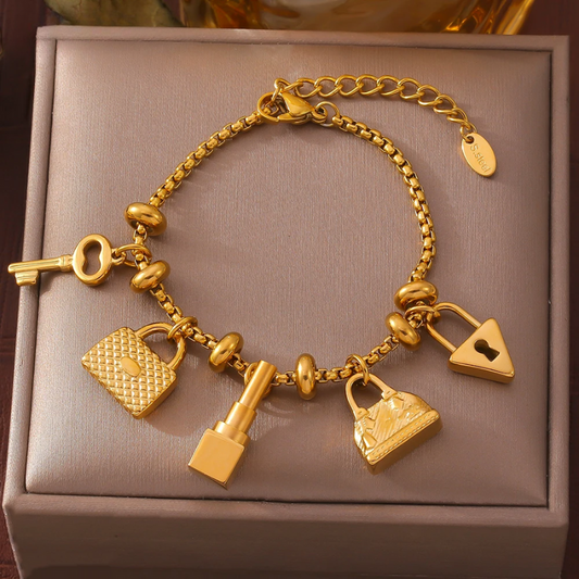 Women's adjustable charm bracelet with unique, elegant charms. A perfect fashion accessory & women's jewelry.