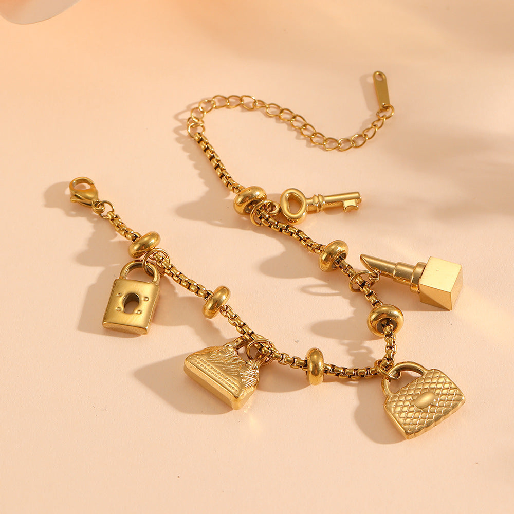 Silver adjustable charm bracelet with unique charms, a chic women's jewelry fashion accessory.