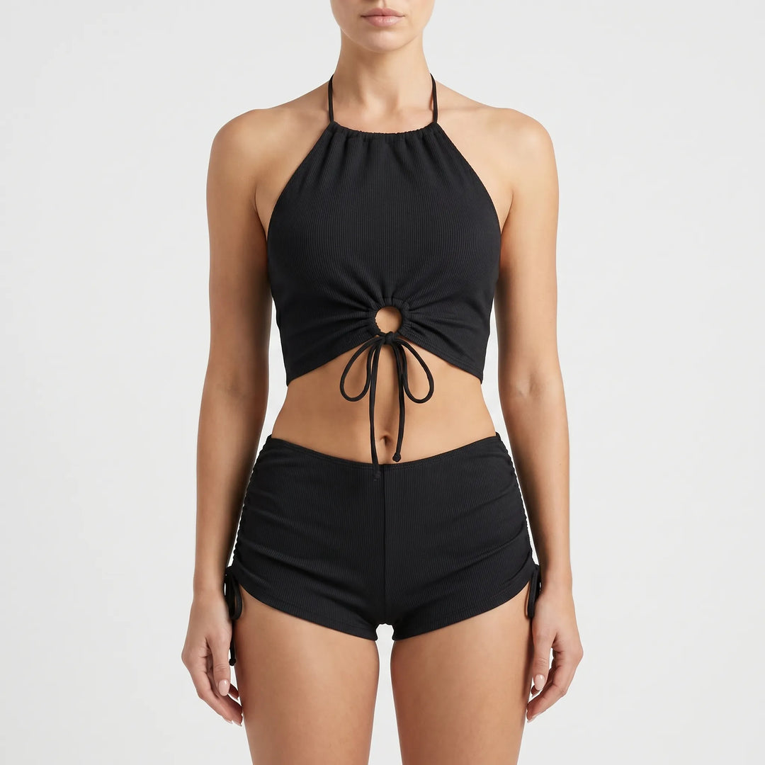 Modest women's halter neck tankini and boyshorts swimsuit set. Quick-dry fabric, comfortable summer beachwear.