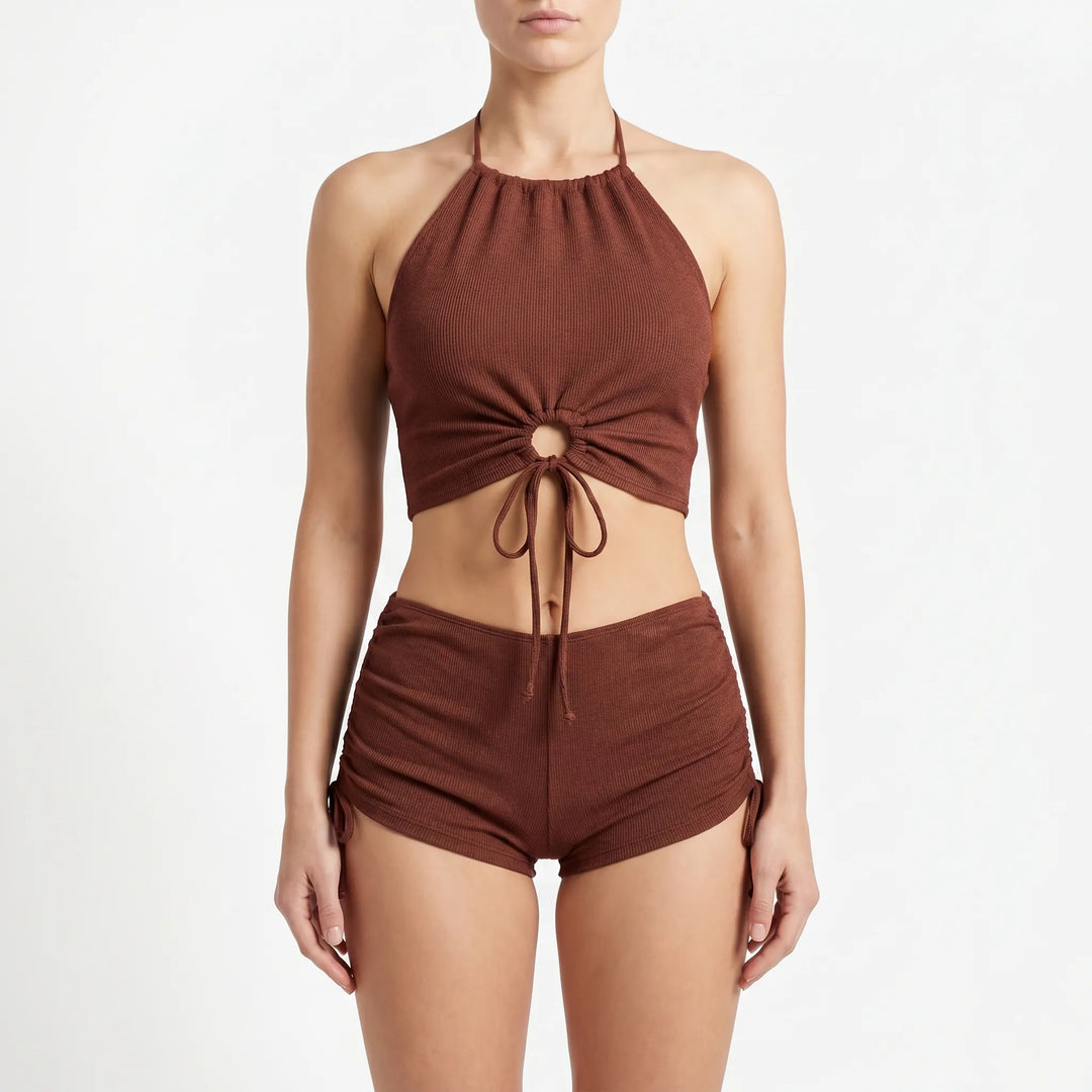 Stylish women's adjustable two-piece halter tankini and boyshort set. Modest beachwear for a confident look.