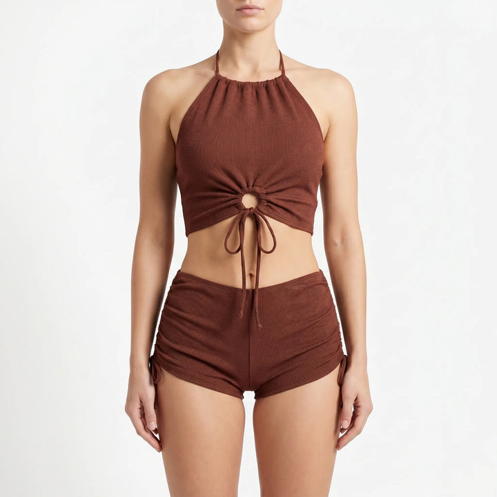 Stylish women's adjustable two-piece halter tankini and boyshort set. Modest beachwear for a confident look.