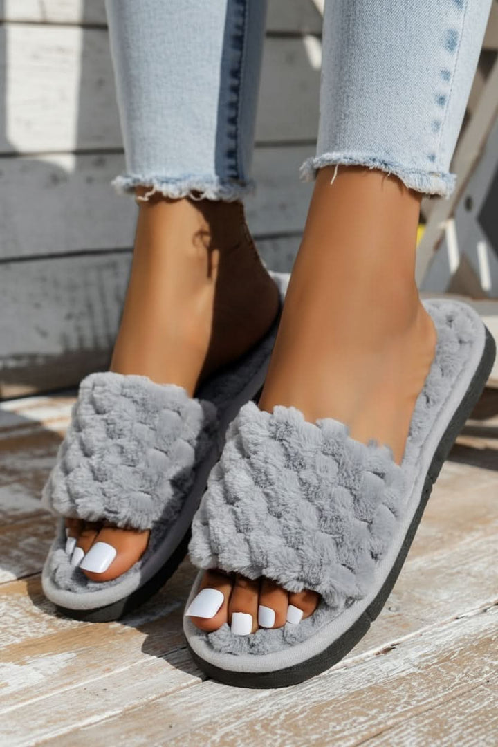 Women's adjustable open-toe comfort slippers in a cozy home setting, perfect for relaxation & indoor wear.