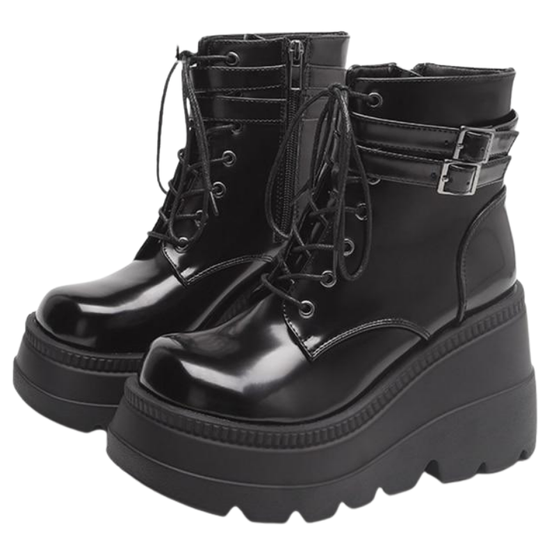 Detail of the waterproof material and sturdy platform heel on Women's Adora ankle boots. Edgy style.