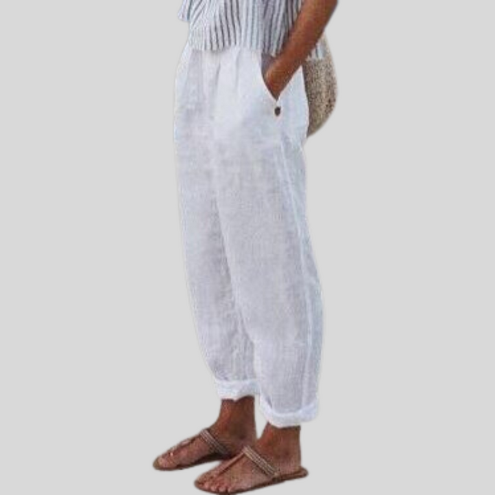 Airy women's pull-on trousers, wide-leg design with folded hem. Comfortable, breezy pants for relaxed summer fashion.