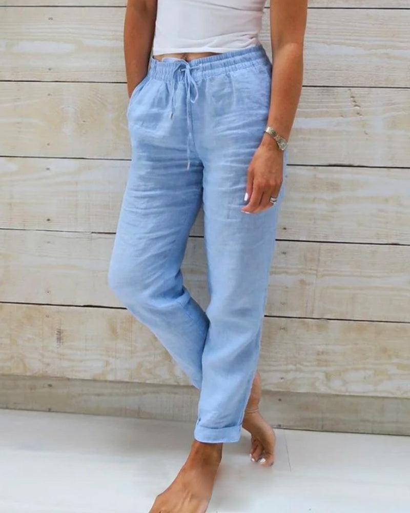 Women's airy summer pants with elastic waistband, loose fit & comfortable fabric, perfect for casual everyday wear.