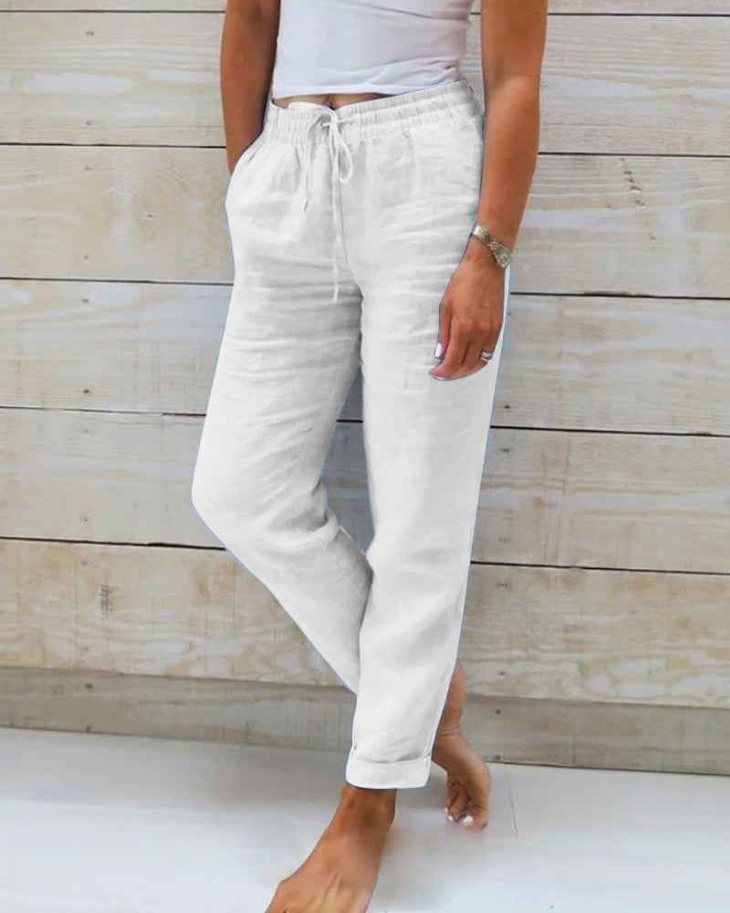 Stylish women's airy summer pants featuring a comfortable elastic waistband & flowy, loose fit.