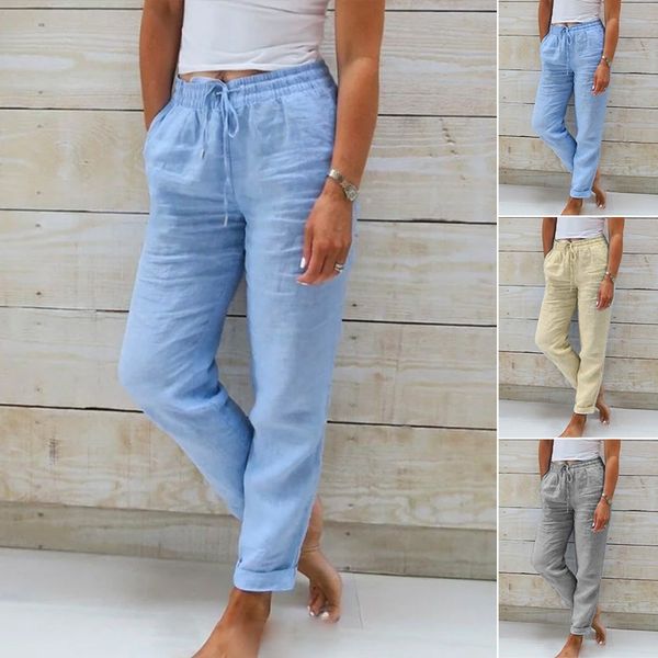 Woman wearing comfortable, airy summer pants with elastic waist. Perfect for a relaxed, casual look.