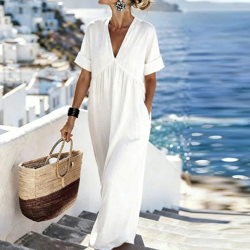 Stylish Alisssa women's v-neck bohemian maxi dress, featuring convenient pockets and a relaxed short-sleeve design.