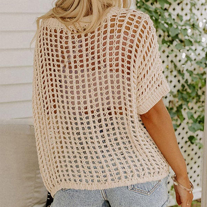 Stylish women's fishnet short sleeve tee. Perfect knit top for casual wear, date night, or beach coverup.