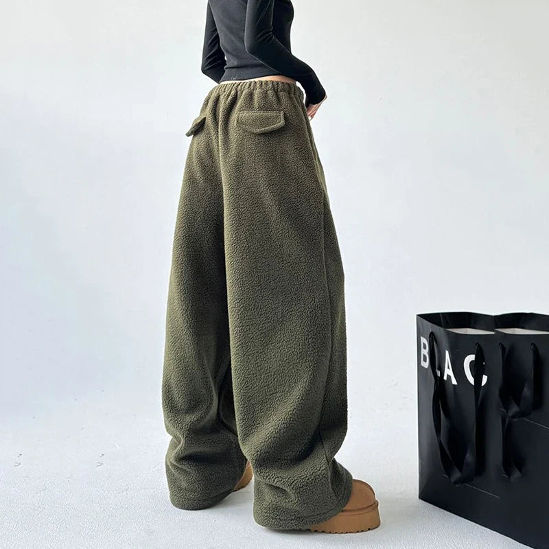 Navy blue Alta relaxed fit sweatpants, offering ultimate comfort & a wide leg style for women's casual wear.
