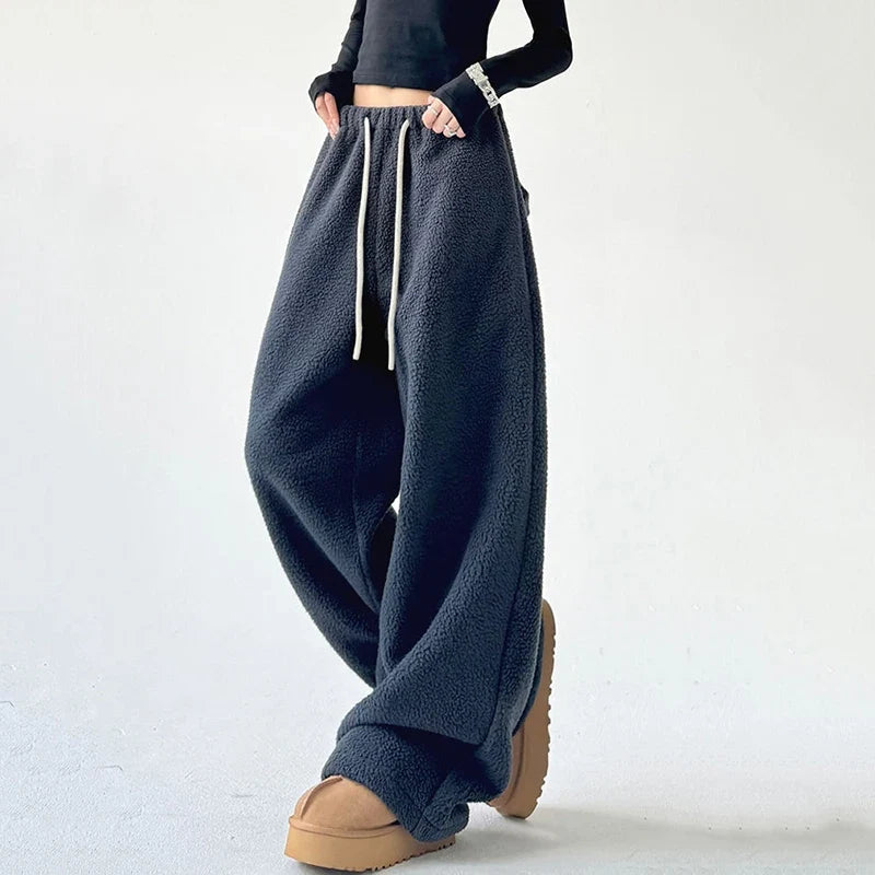 Comfortable women's Alta wide leg sweatpants; a relaxed fit with a stylish drawstring, great for any casual look.