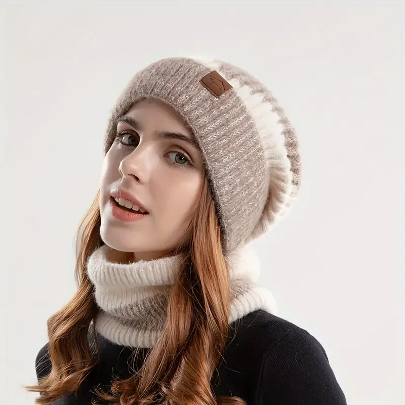 Close-up of Amara women's warm beanie and scarf set, showing soft, cozy knit fabric. Perfect elegant winter accessory.