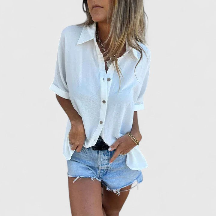 Versatile Amber long-sleeve women's blouse. Elegant button-up shirt for casual or professional office wear.