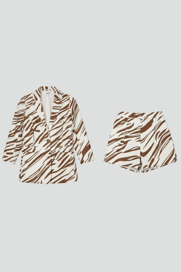 Complete women's animal print co-ord set, a stylish blazer and shorts matching ensemble.