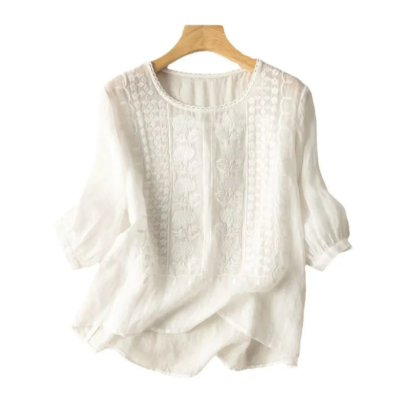 Women's Annelise embroidered floral puff sleeve blouse with three-quarter sleeves and a round neck, ideal for spring.