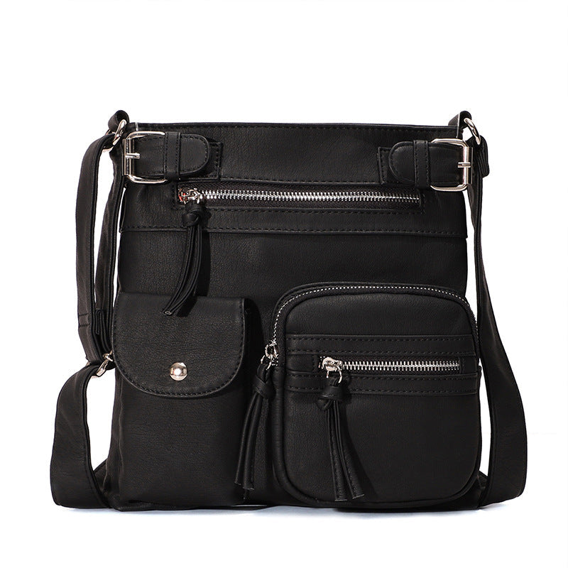 Women's anti-theft crossbody bag in sleek black, perfect for travel & everyday security.