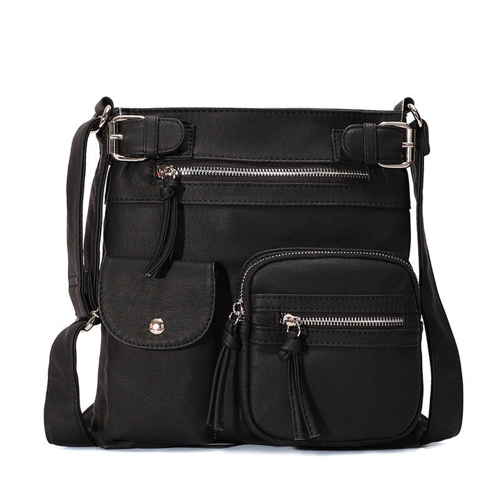 Women's anti-theft crossbody bag in sleek black, perfect for travel & everyday security.